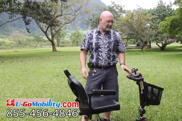 UGo Mobility instructor demonstrating the neutral switch on a mobility scooter